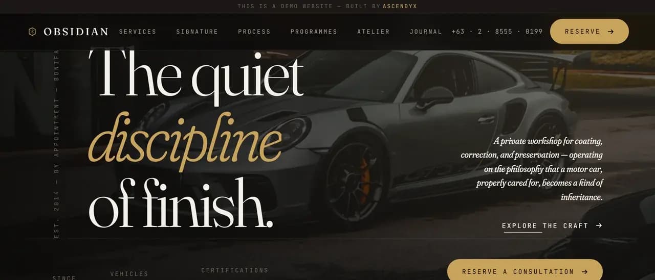 A close frame on the demo hero type, the words The quiet discipline of finish set in a high contrast serif with discipline in brass italic, beside a vertical line of mono capitals