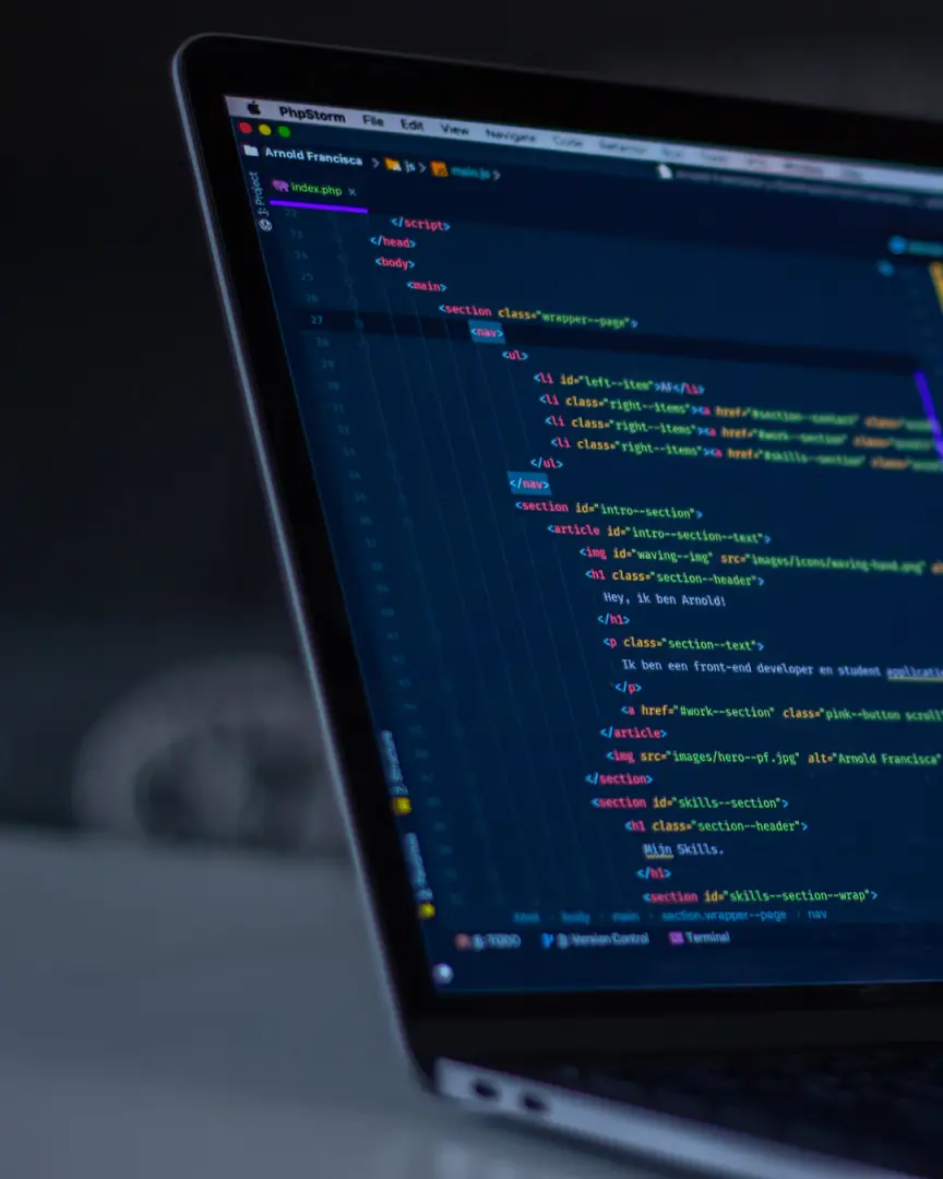 Developer working through code on a dark editor